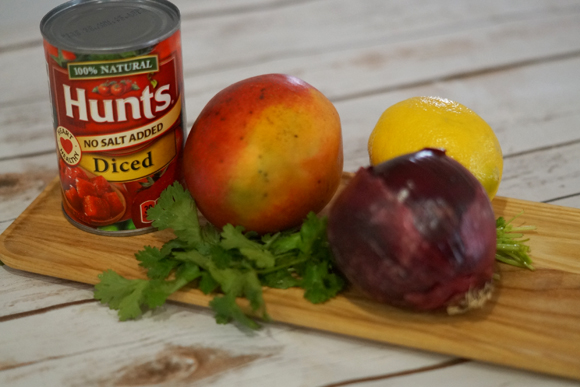 Try this easy to follow fresh mango salsa recipe. Perfect for summer parties! #HuntsFreshTwist #ad