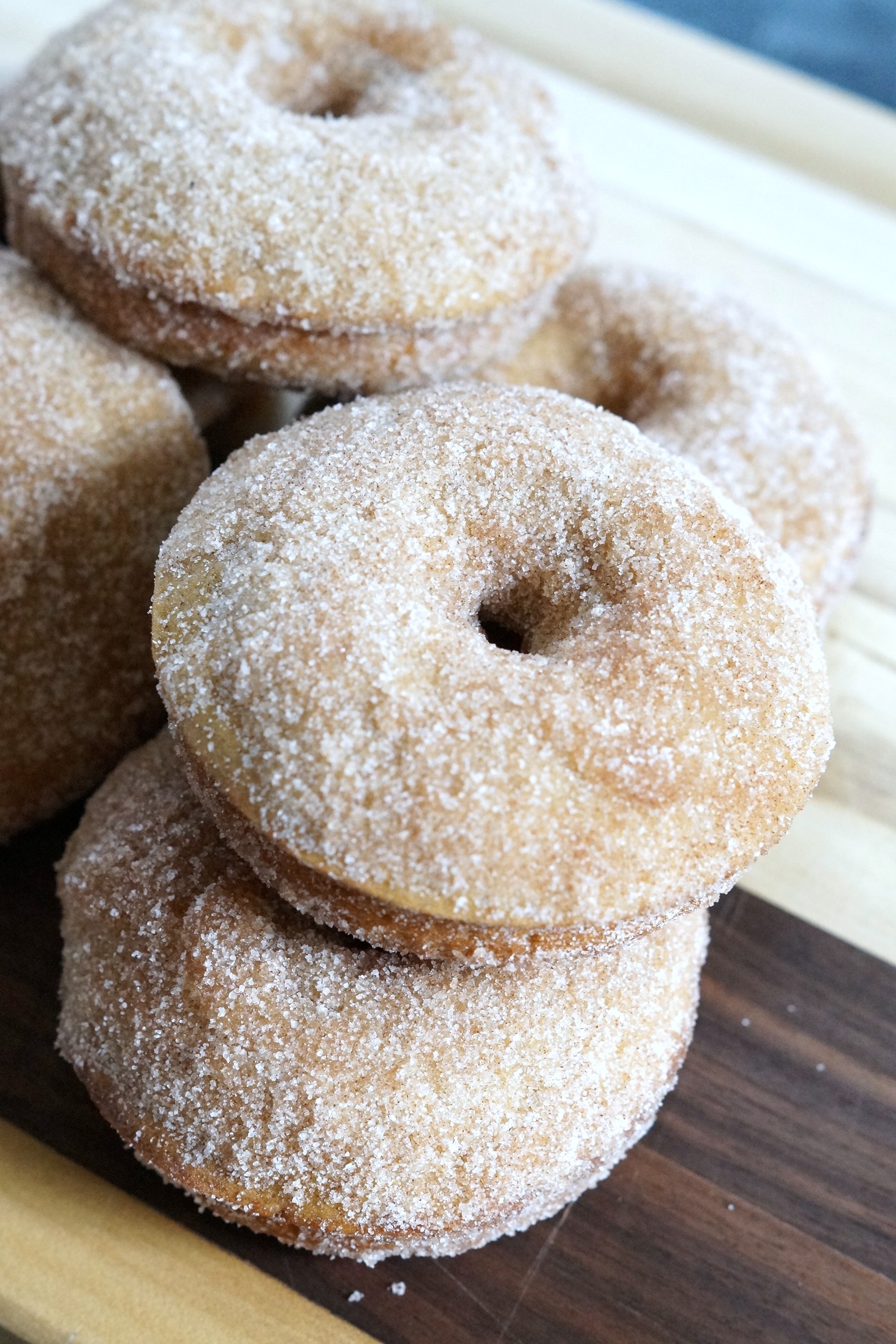 Learn how to make cinnamon sugar baked donuts by following this simple recipe! Cinnamon sugar baked donuts are perfect for lazy weekends!